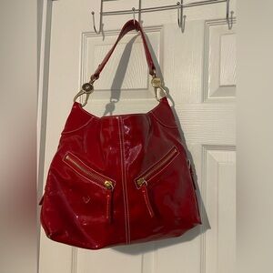 Dooney & Bourke red patent shoulder bag with gold accents Purse Handbag Read